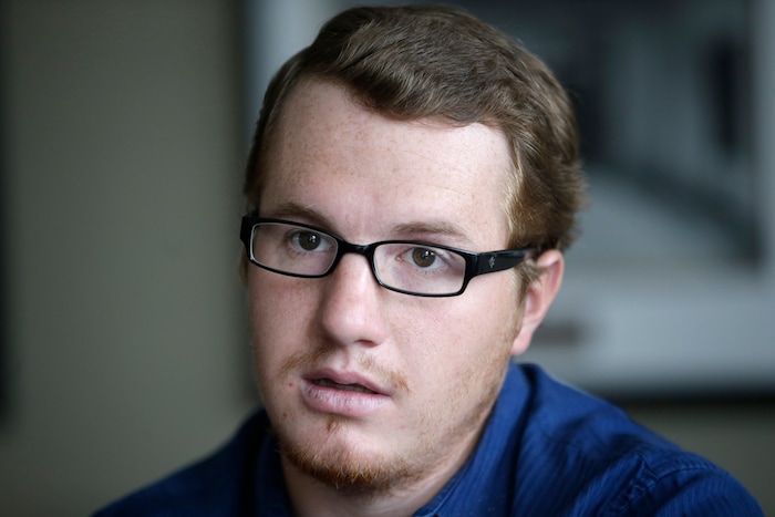 FILE - In this Oct. 2, 2015, file photo, Roy Jeffs, son of polygamist leader Warren Jeffs, speaks during an interview, in Salt Lake City. Roy Jeffs, 26-year-old man who spoke out against an infamous polygamous-sect leader who was also his father has died. Rachel Jeffs said Tuesday, June 4, 2019, her brother Roy was abused sexually and physiologically by their father Warren Jeffs and died by suicide on May 29. (AP Photo/Rick Bowmer, File)