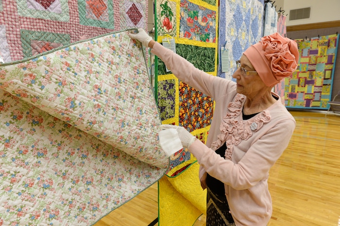 (Francisco Kjolseth  |  The Salt Lake Tribune)  Nacele Hart overlooks her more than 100 quilts and numerous sewing projects created over a 10-year period for her children, grandchildren and great-grandchildren. On Friday at a church in Orem her family put them on display with plans to hand them out Saturday to her loved ones. She's also currently battling cancer.
