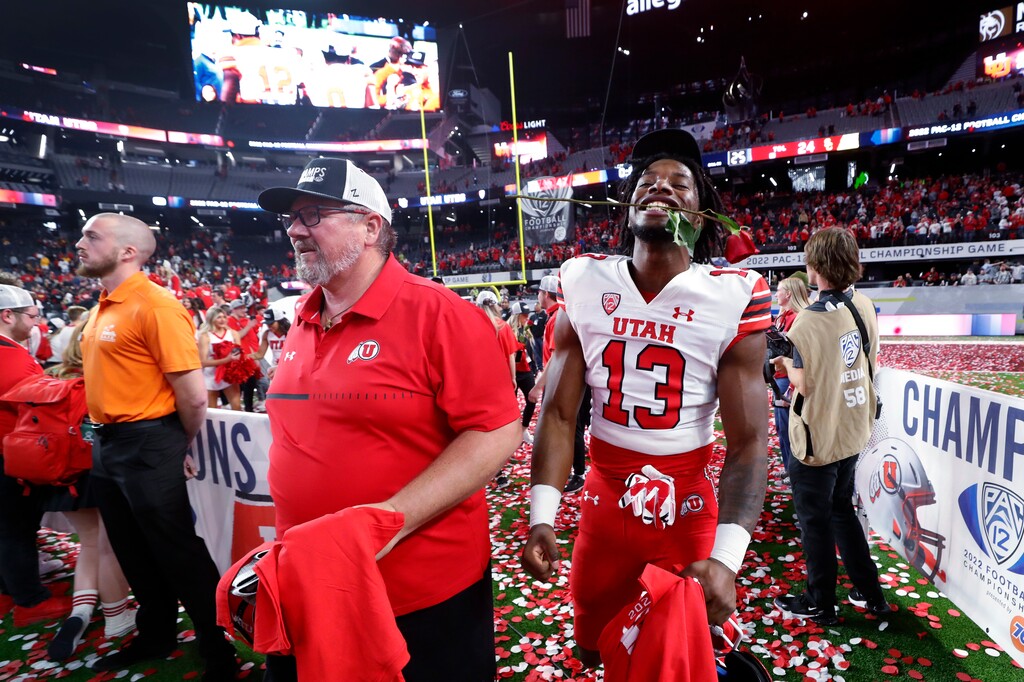 Utah quarterback Nate Johnson (13) celebrates after Utah's 47-24 victory over Southern California in the Pac-12 Conference championship NCAA college football game Friday, Dec. 2, 2022, in Las Vegas. (AP Photo/Steve Marcus)