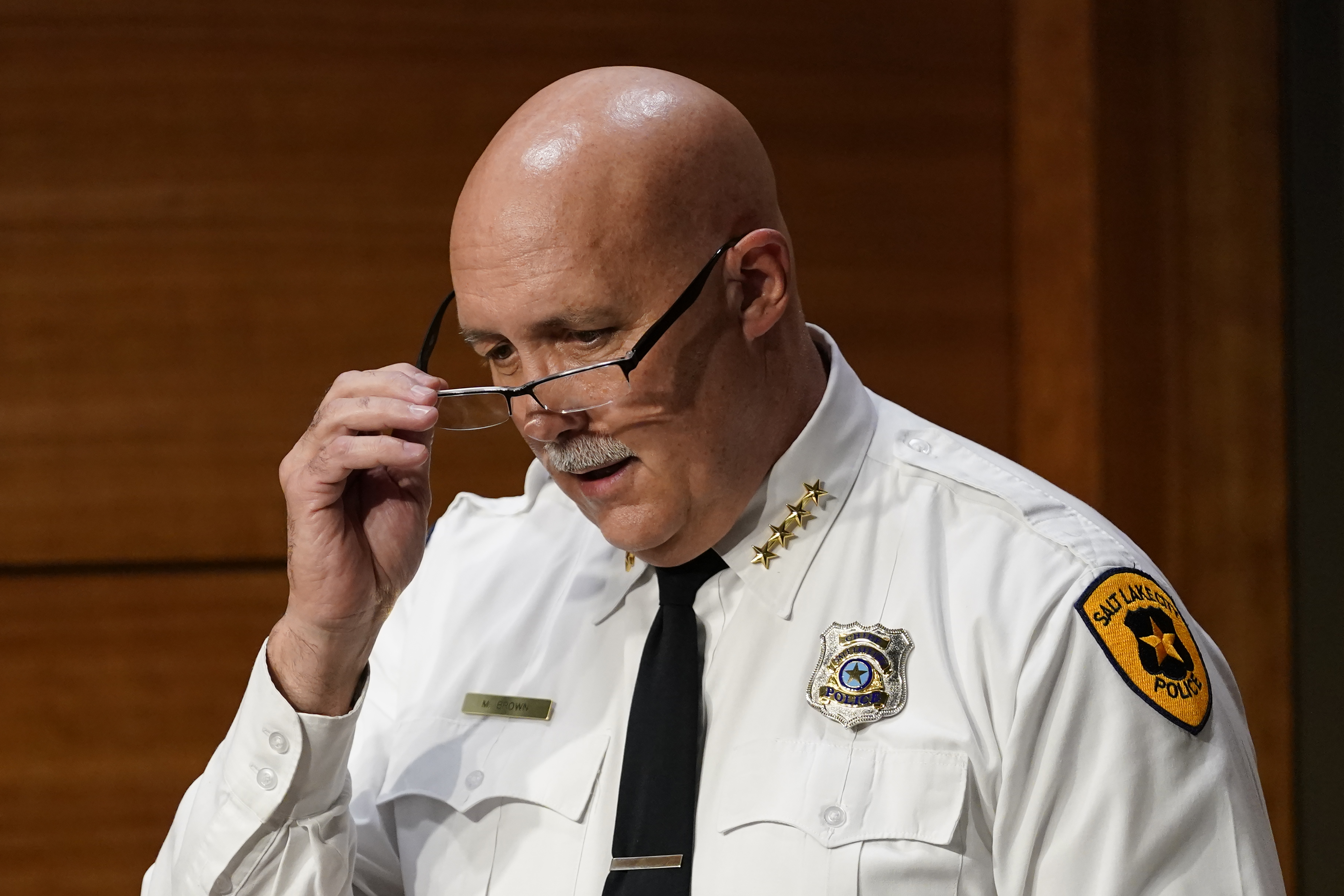 (AP Photo/Rick Bowmer, File)
In this Sept. 21 photo, Salt Lake City Chief of Police Mike Brown speaks during a news conference in Salt Lake City. Salt Lake City's police dog apprehension program will remain suspended indefinitely, the police chief announced Sept. 25, after an officer ordered a dog to attack a Black man who had put his hands in the air.