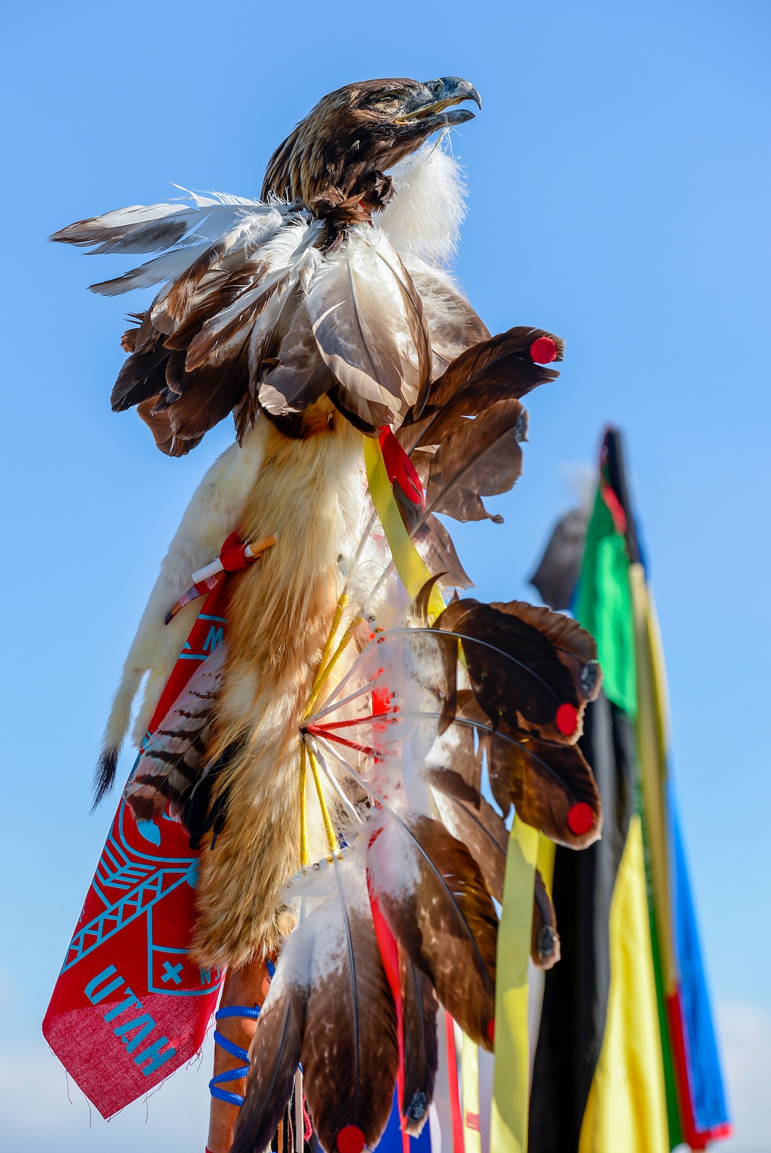 Leah Hogsten  |  The Salt Lake Tribune  The golden eagle staff of Carl Moore, a Hopi and Chemehuevi Native American. Moore performed a hoop dance, made offerings to Mother Earth, sang and gave a prayer. The "Stop the Polluting Port" community coalition staged a May Day celebration, calling for respect and awareness of the water, earth and air regarding the 20,000 acres west of Salt Lake City where the inland port industrial site has been proposed.