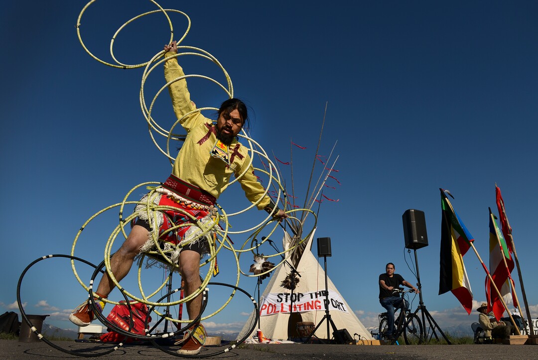 Leah Hogsten  |  The Salt Lake Tribune  Carl Moore, a Hopi and Chemehuevi Native American performs a hoop dance in honor of Mother Earth. Moore also made offerings, sang and gave a prayer during the May Day celebration. The "Stop the Polluting Port" community coalition staged a May Day celebration, calling for respect and awareness of the water, earth and air regarding the 20,000 acres west of Salt Lake City where the inland port industrial site has been proposed.
