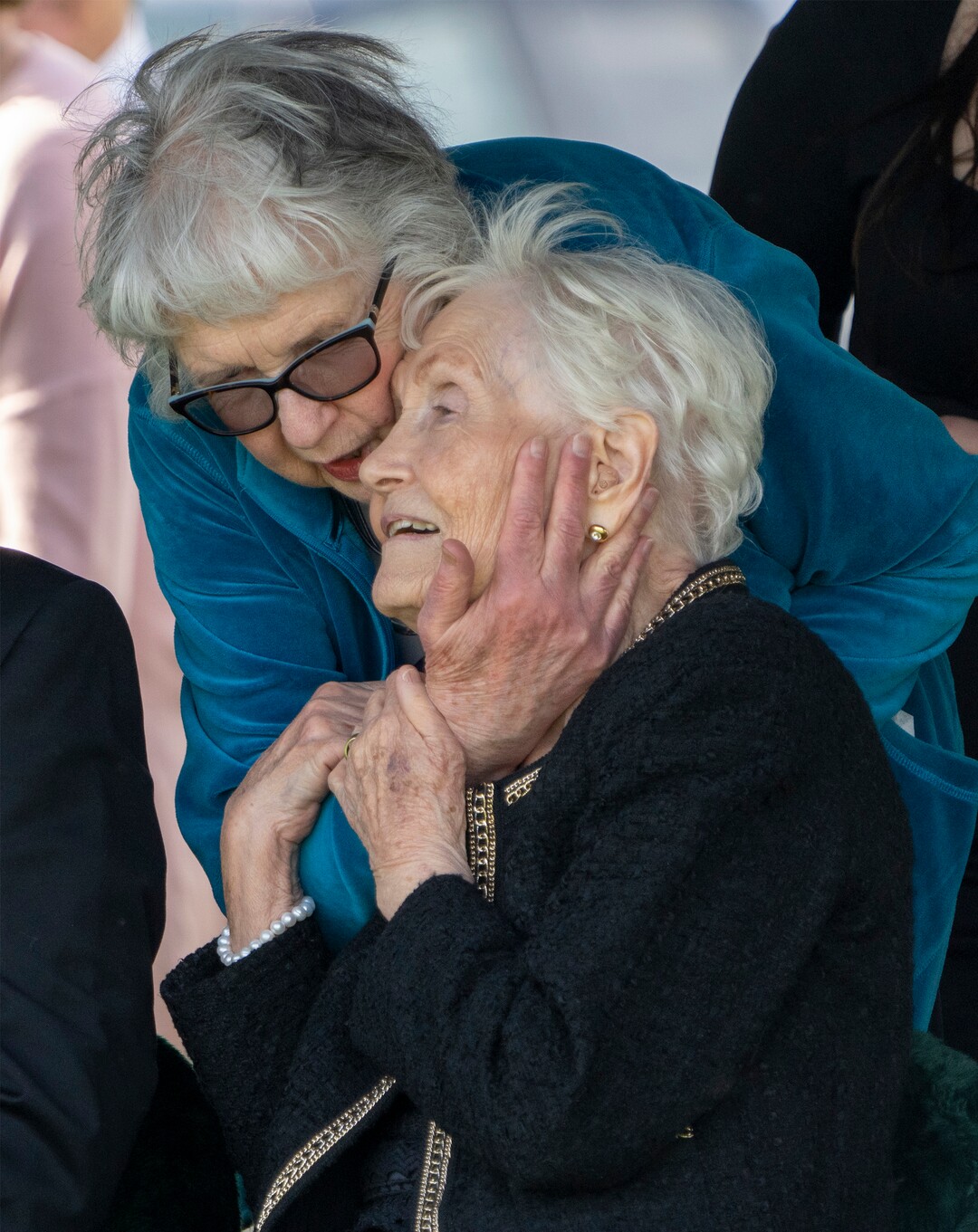 (Rick Egan | The Salt Lake Tribune)  Elaine Hatch is confronted by a a loved one, at the grave side of her husband, Orrin Hatch, at the Newton Cemetery, on Friday, May 6, 2022.