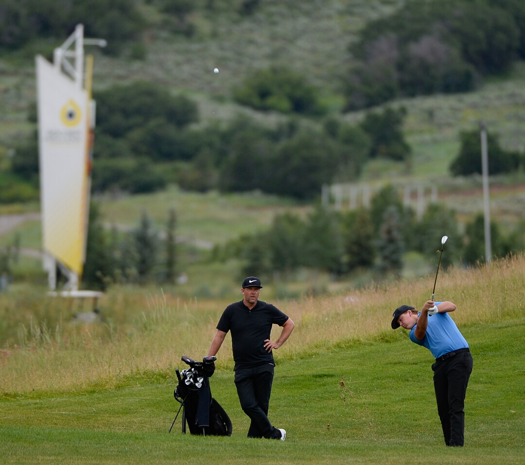 (Francisco Kjolseth  |  The Salt Lake Tribune)  Preston Summerhays, 16, joined by his father Boyd Summerhays repeats as State Amateur golf champion at Soldier Hollow Golf Course on Saturday, July 13, 2019, beating Chase Lansford 7 and 6 in the final championship match.