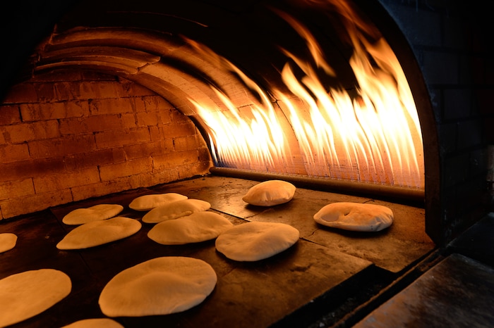 (Francisco Kjolseth  |  The Salt Lake Tribune)  Baked pita bread at Beirut Cafe in Murray.