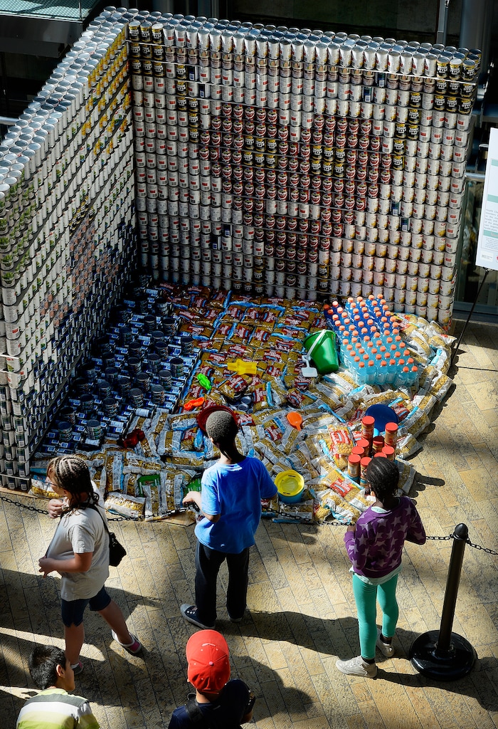 (Scott Sommerdorf | The Salt Lake Tribune) The Salt Lake City Public Library hosted a community display and food drive focused on healthy food items for the Utah Food Bank. Teams from six local health careÐrelated businesses built giant sculptures using healthy canned, bagged, and boxed foods. The replica of Rice-Eccles Stadium won the public choice award, Thursday, August 10, 2017.
