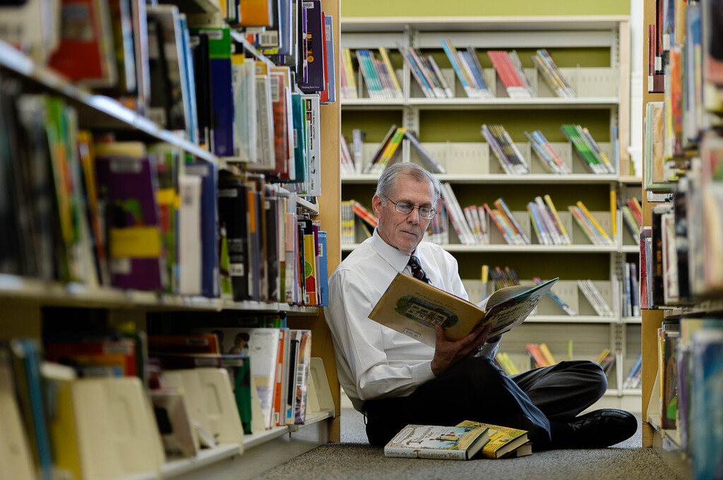 Francisco Kjolseth | The Salt Lake Tribune
Provo Library Director Gene Nelson read more than 300 children's books in 2016, many of them two or even three times, to help determine the 2017 Newbery Medal winner, awarded annually by the American Library Association. Adding to his 20-30 hours a week of reading, Nelson overlooks some of the books he's read at the Provo Library recently.
