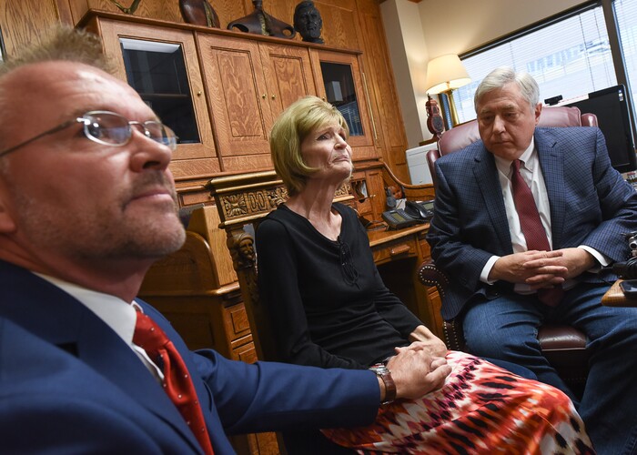 (Francisco Kjolseth  |  The Salt Lake Tribune)  Grant Stanfield and his mother Connie Elison, left, brother and mother of Thomas Stanfield who was shot and killed by a Citadel security guard last week, speak with the press at the office of their attorney, Robert Sykes, at right, in Salt Lake City on Tuesday, June 26, 2018, after filing a civil rights and wrongful death law suit.