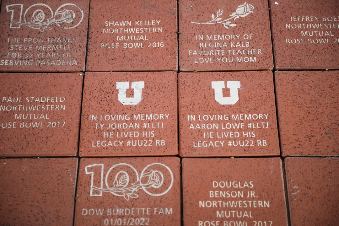 (Meg Oliphant | Special to The Tribune) Bricks in memory of Utah players Ty Jordan and Aaron Lowe are displayed in front of Rose Bowl Stadium on Jan. 2, 2023 in Pasadena, Calif.