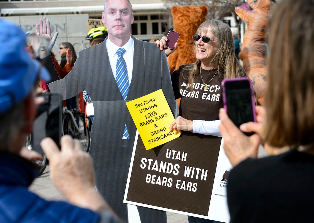 Supporters of Bears Ears with rally outside the Salt Palace Convention Center in Salt Lake City, Friday, Feb. 9, 2018, where U.S. Secretary of the Interior Ryan Zinke was scheduled to speak at the Western Hunting and Conservation Expo. (Steve Griffin/The Salt Lake Tribune via AP)