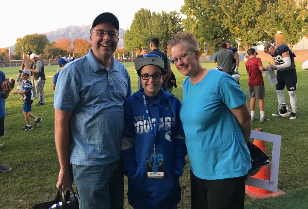 Norma Gonzalez | The Salt Lake Tribune. Doug and Emily Page with their 12-year-old son Wyatt, center, at a recent BYU football practice.