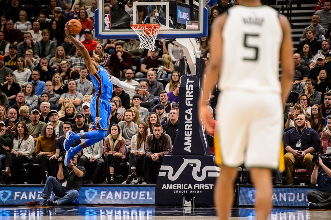 (Trent Nelson | The Salt Lake Tribune)  Oklahoma City Thunder forward Paul George (13) dunks the ball after a steal as the Utah Jazz host the Oklahoma City Thunder, NBA basketball in Salt Lake City, Saturday December 23, 2017.