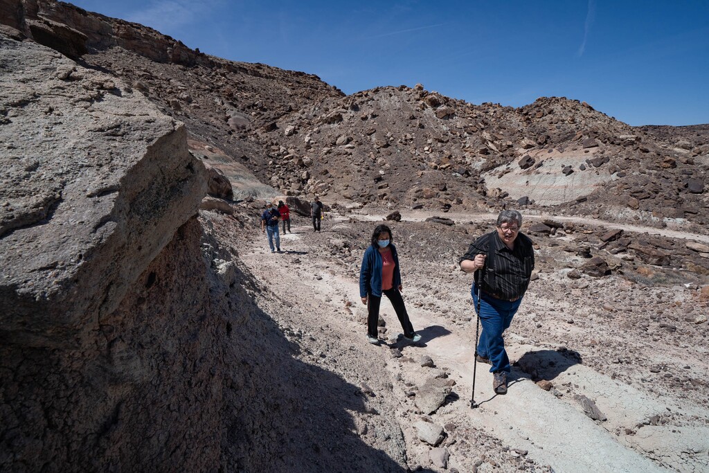 (Francisco Kjolseth  | The Salt Lake Tribune) State Sen. Jani Iwamoto, center, and Utah Paleontologist Jim Kirkland tour the site of the new Utahraptor State Park. Iwamoto was the co-sponsor of the legislation creating the park, which contains the largest array of dinosaur species on the planet. It is also the site of a World War II Japanese isolation camp that will be memorialized within the park. 