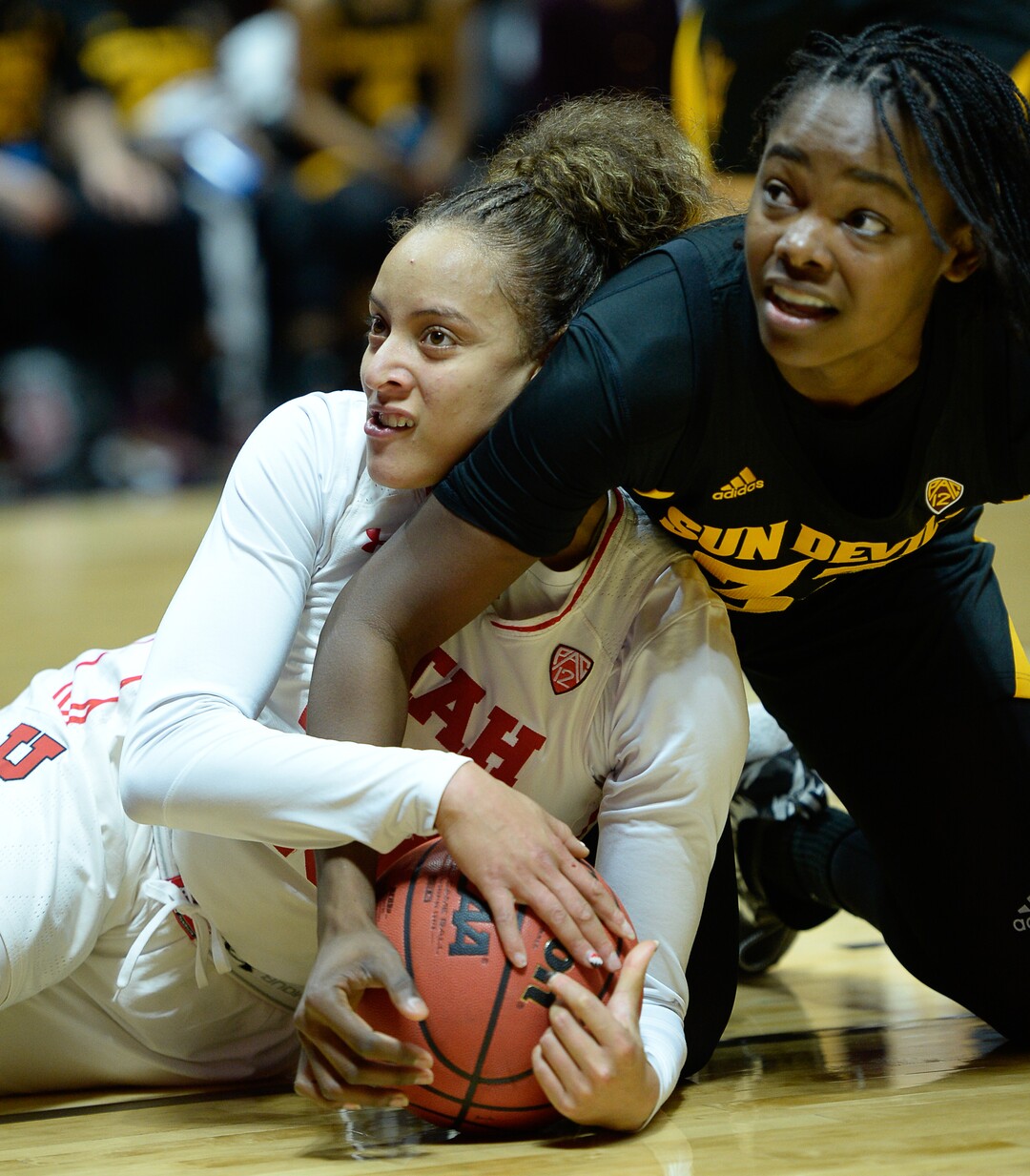 (Francisco Kjolseth  |  The Salt Lake Tribune)  Utah Utes guard/forward Daneesha Provo (23) battles Arizona State Sun Devils center Charnea Johnson-Chapman (33) in Utes' Pac-12 home opener at the Jon M Huntsman Center on Friday, Jan. 4, 2019. They're off to one of their best starts in team history.