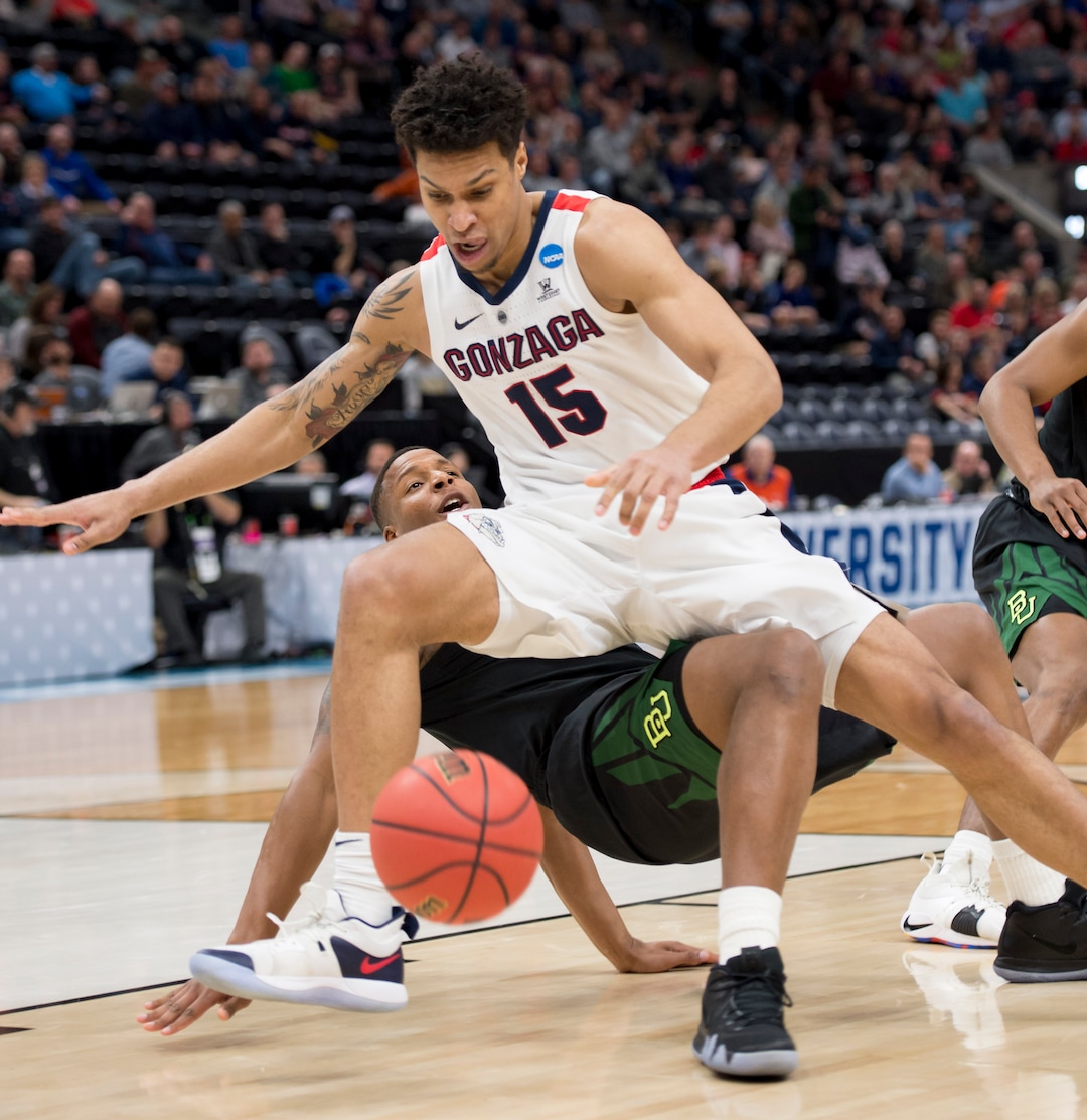(Leah Hogsten  | The Salt Lake Tribune)  Gonzaga Bulldogs forward Brandon Clarke (15) collides with Baylor Bears guard Mark Vital (11) as Baylor faces Gonzaga in the second round of the NCAA tournament in Salt Lake City on Saturday, March 23, 2019.