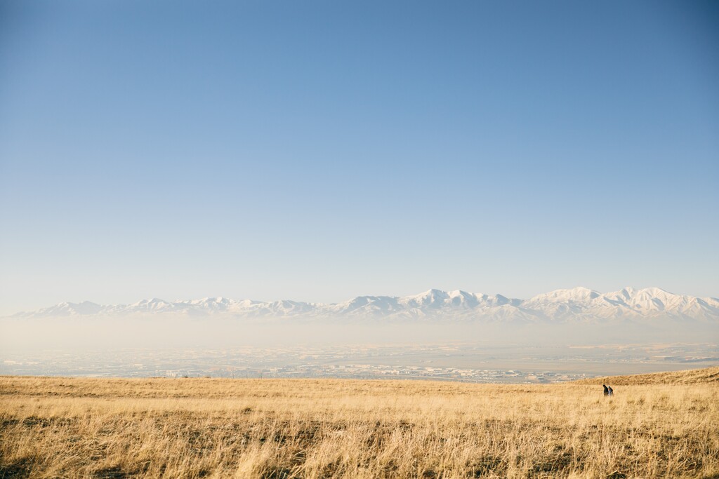 (Rachel Rydalch | The Salt Lake Tribune) Two hikers enjoy a walk above the inversion pollution at Tunnel Springs Park in Salt Lake City on Saturday, Jan. 29, 2022. A cold front will help clean out the valleys this week, but it will only be a temporary fix.