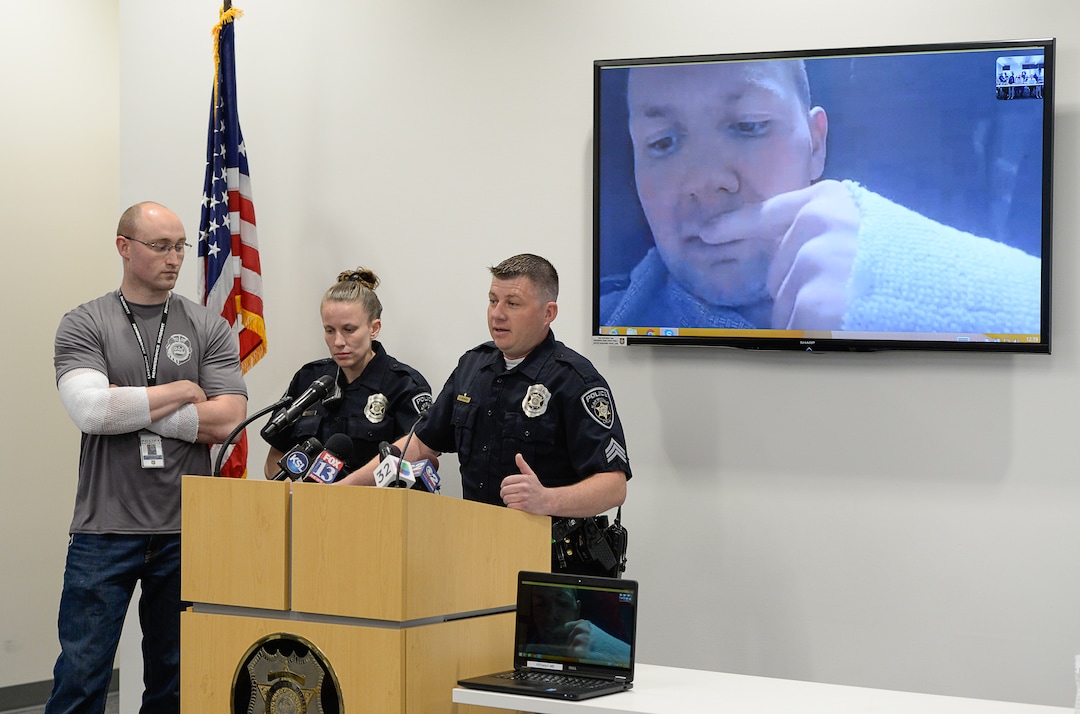 (Francisco Kjolseth  |  The Salt Lake Tribune)  The Kaysville officers that responded to the suicidal subject call on April 5, 2018, and were injured in the fire, speak with the media on Thursday, April 12, 2018. Officer Robert Jackson, 26, who appeared by video, is recovering at University Hospital burn unit,  after he and officers Cade Bradshaw, Lucy Turner and Sgt. Shawn McKinnon, center, answer questions following the incident at a Chevron gas station store where a man doused himself with gasoline. As the officers tried to get a lighter from the manÕs hand, the man lit himself on fire.