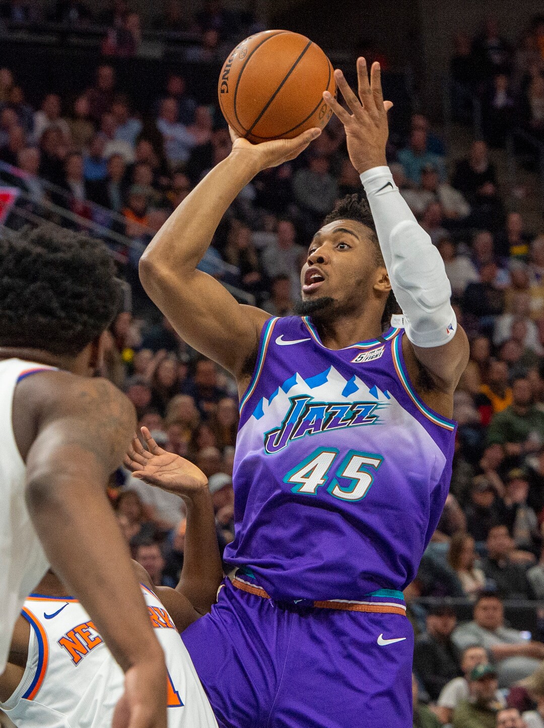 (Rick Egan  |  The Salt Lake Tribune)  Utah guard Donovan Mitchell (45) takes a shot for the Jazz, in NBA action between the Utah Jazz and the New York Knicks, in Salt Lake City, Wednesday, Jan. 8, 2020.