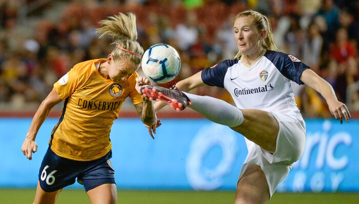 (Francisco Kjolseth  |  The Salt Lake Tribune)  Utah Royals FC midfielder Gunnhildur Jnsdttir (66) gets kicked in the face by North Carolina Courage midfielder Samantha Mewis (5) as Utah Royals FC hosts the North Carolina Courage at Rio Tinto Stadium in Sandy, Utah on Saturday, July 27, 2019.
