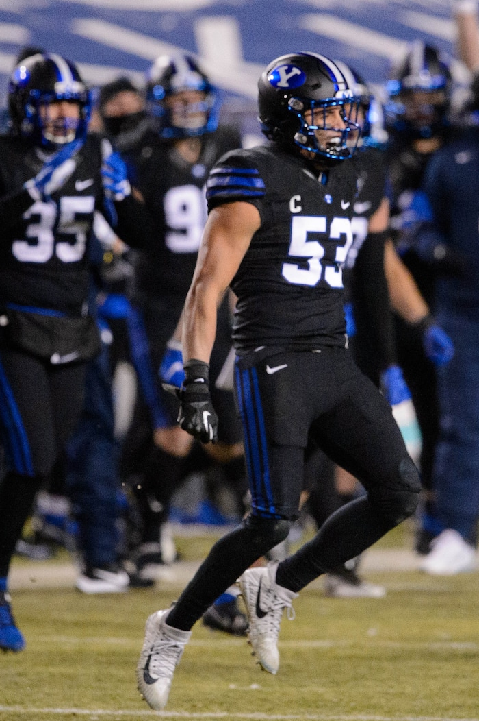 (Trent Nelson | The Salt Lake Tribune) Brigham Young Cougars linebacker Isaiah Kaufusi (53) celebrates a 17-14 lead as BYU hosts San Diego State, NCAA football in Provo on Saturday, December 12, 2020.