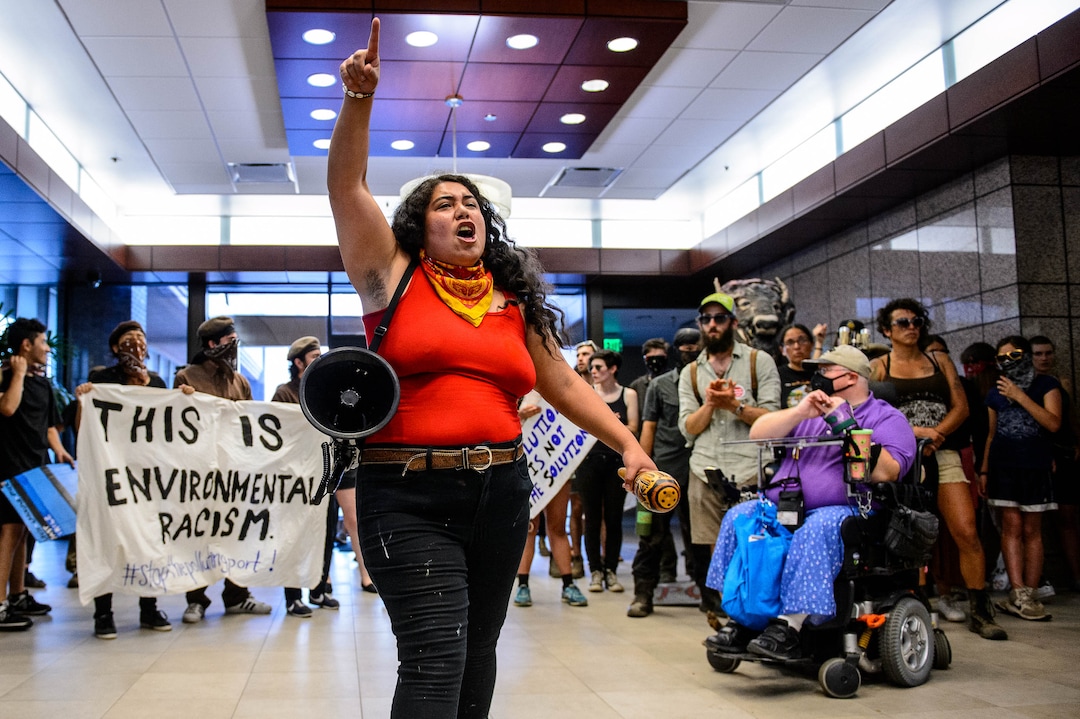 (Trent Nelson  |  The Salt Lake Tribune)  Mariella Mendoza speaks as people protesting the Inland Port occupy the Chamber of Commerce Building in Salt Lake City on Tuesday, July 9, 2019.