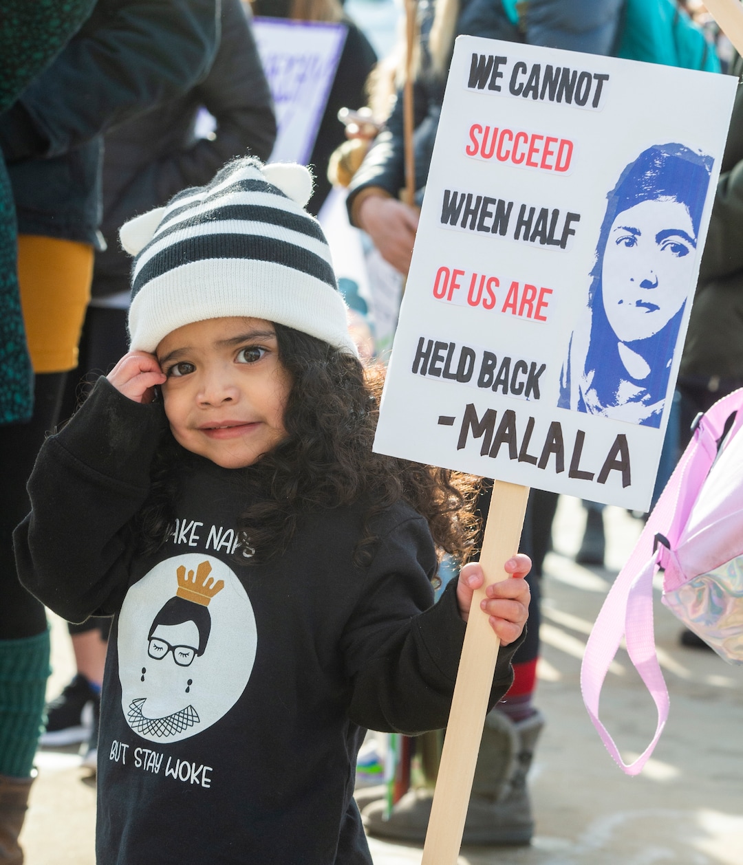 (Rick Egan  |  The Salt Lake Tribune)   Eva Cruz, 3, holds a sign at the Utah State Capitol after marching up State Street, in the 2020 Womxn's March in Salt Lake City, Saturday, Jan. 18, 2020.