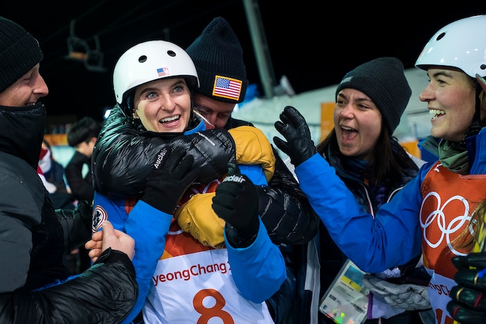 (Chris Detrick  |  The Salt Lake Tribune)  Kiley McKinnon celebrates with friends and USA Madison Olsen, right, after qualifying for finals the during the Ladies' Aerials Qualification at Phoenix Park during the Pyeongchang 2018 Winter Olympics Thursday, Feb. 15, 2018.  