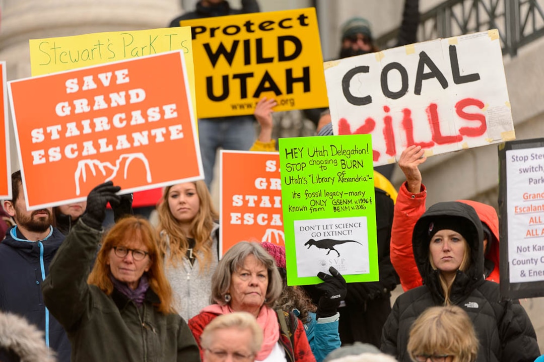 (Trent Nelson | The Salt Lake Tribune)  Citizens with signs at a rally on the steps of the State Capitol Building in Salt Lake City against Rep. Chris Stewart's Grand Staircase bill that would create an Escalante National Park. Tuesday December 12, 2017.