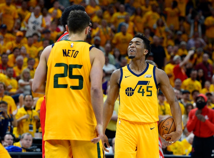 (Scott Sommerdorf | The Salt Lake Tribune)
Utah Jazz guard Donovan Mitchell (45) jaws at Houston Rockets center Clint Capela (15) after the two grappled for a loose ball. The Rockets beat the Jazz 100-87, Sunday, May 6, 2018.