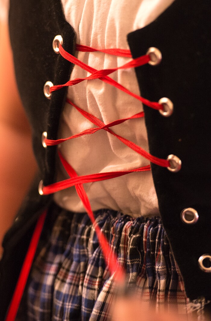 (Leah Hogsten  |  The Salt Lake Tribune) Traditional Scottish dress called an aboyne is laced prior to Saturday's Highland Dance Competition, October 28, 2017 at the First Presbyterian Church during its annual two-day Scottish Festival celebrating the Scottish heritage of the church. 