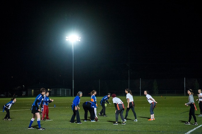 (Chris Detrick | The Salt Lake Tribune) Team A Lot plays Sim Team during the flag football team game at North University Fields in Provo Thursday, November 30, 2017.