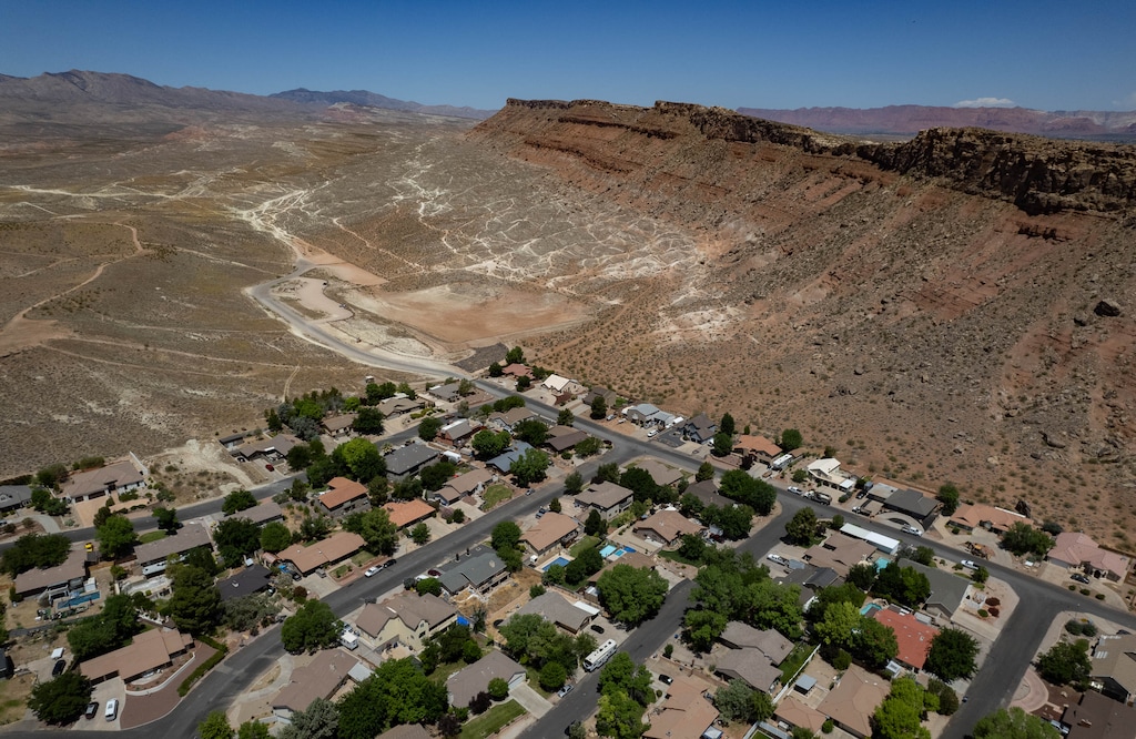 (Francisco Kjolseth  |  The Salt Lake Tribune) The New Bearclaw Poppy Navajo Trailhead in St. George depicts the eastern edge of the area known as Red Cliffs Desert Reserve (Zone 6) on Tuesday, June 11, 2024. Over 6,800 acres were added to the reserve as a swap for allowing to build the Northern Corridor Highway, currently under scrutiny. 
