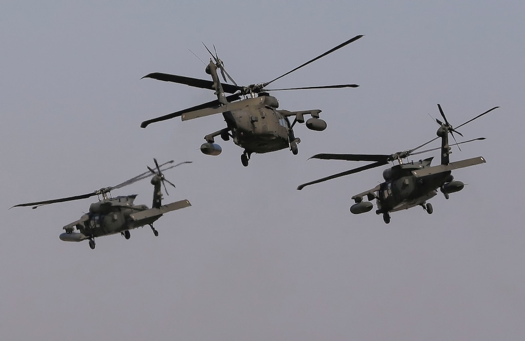 (AP Photo/Vadim Ghirda)

US Army 2nd Battalion, 10th Regiment, 10th Brigade UH-60 Blackhawk helicopters take off during a joint US-Romanian air assault exercise at the Mihail Kogalniceanu airbase, eastern Romania, Wednesday, March 8, 2017. Romanian and U.S troops are staging joint exercises with U.S. Black Hawk helicopters, part of the 10th Combat Aviation Brigade nine-month rotational deployment in support of Operation Atlantic Resolve, which aims to reassure NATO's European allies in light of Russia's invasion in Ukraine.