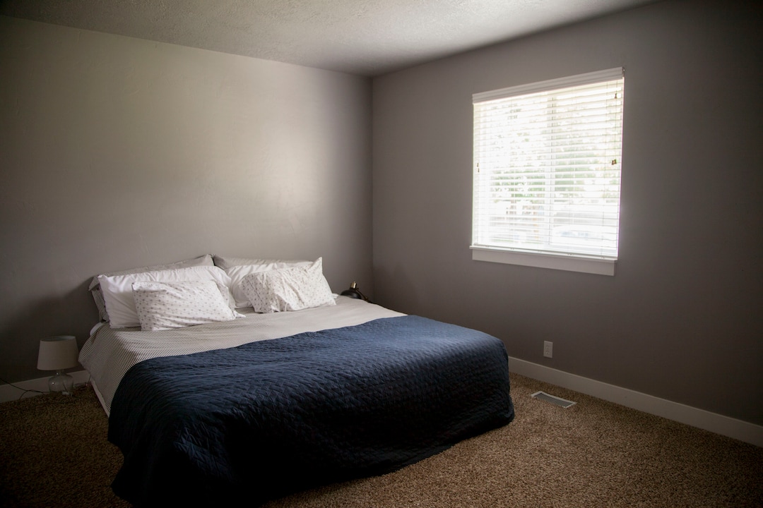 (Stella Yu |  The Salt Lake Tribune) The 2,713-square-foot rambler home in South Jordan includes five bedrooms, three and a half baths, two family rooms, a fireplace, a kitchen, a bar and a semi-formal dining room. A two-car garage is attached to the house with outdoor RV parking space.
