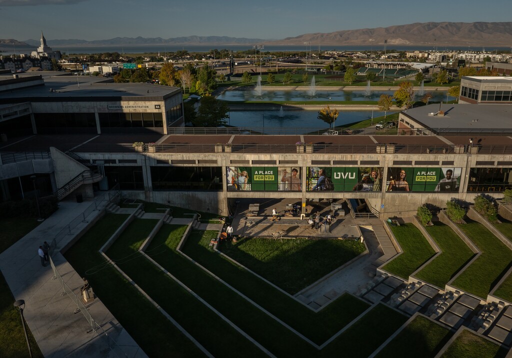 (Loren Elliott | The New York Times) A landscaping crew replaces grass with stone at the courtyard site where the political activist Charlie Kirk was fatally shot last week at Utah Valley University in Orem, Utah, Sept. 15, 2025. After authorities said Kirk's suspected shooter had been "radicalized" online, Meta, Reddit, TikTok and other platforms have stayed quiet — though not Elon Musk, who owns X.