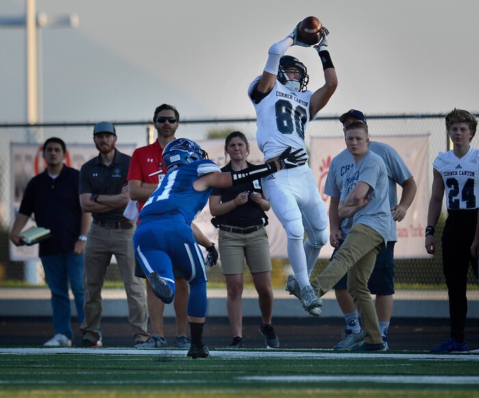 (Scott Sommerdorf | The Salt Lake Tribune) Corner Canyon WR Noah Kjar pulls in a catch to set up a TD as Vikings DB Cooper Caldwell makes the tackle during first half play. Corner Canyon led Pleasant Grove 14-3 at the half, Friday, August 18, 2017.