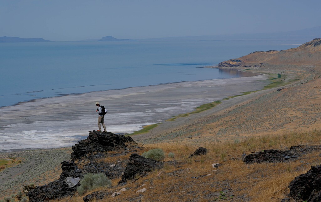 (Francisco Kjolseth | The Salt Lake Tribune) Keith Hambrecht, invasive species coordinator for the state lands division, takes in the view from Fremont Island on the Great Salt Lake on Tuesday, July 18, 2023. The new Water Documenters project will publish notes from public water meetings and have them available for the public.