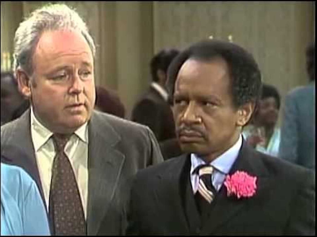 (Photo courtesy of CBS) Carroll O'Connor as Archie Bunker and Sherman Hemsley as George Jefferson in "All In the Family."
