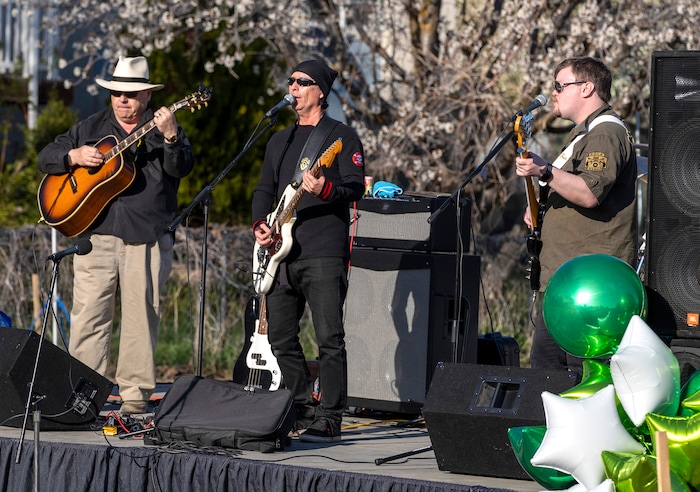 (Rick Egan | The Salt Lake Tribune) Moe Low plays at the Earth Day Party at the Mini Taylor farm at at the Jennie Taylor's residence, in North Ogden. Taylor is the widow to the late Major. Brent Taylor, killed in 2018 while on Army National Guard duty in Afghanistan, donations have helped restore the small family farm, with planter boxes, a chicken coop, and a sandbox for the kids, on Thursday, April 22, 2021.