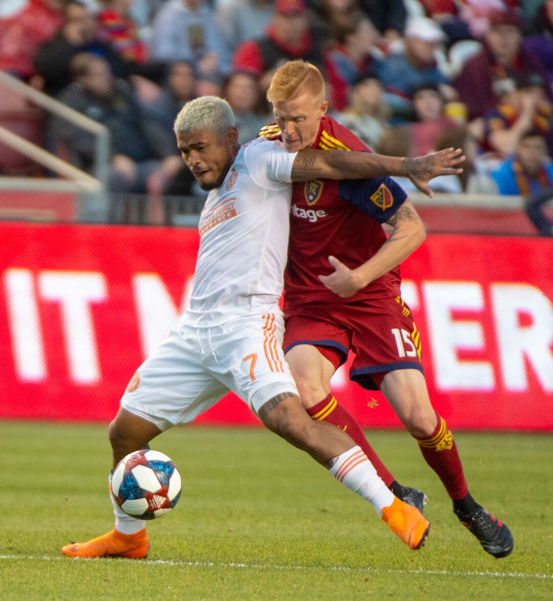 (Rick Egan  |  The Salt Lake Tribune).  Atlanta United forward Josef Martinez (7) goes for then ball along with Real Salt Lake defender Justen Glad (15), in MLS soccer action between Real Salt Lake and Atlanta United at Rio Tinto Stadium in Sandy, Friday, May 24, 2019.