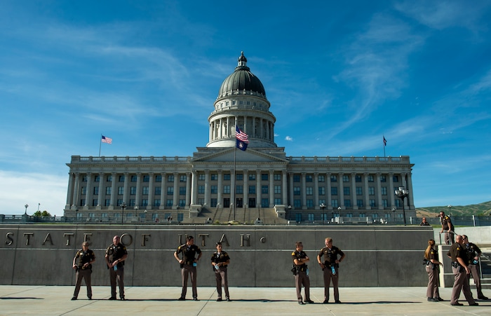 (Rick Egan  |  The Salt Lake Tribune)     The Highway Patrol takes their places infant of the Utah State Capitol ,Monday, June 1, 2020.


