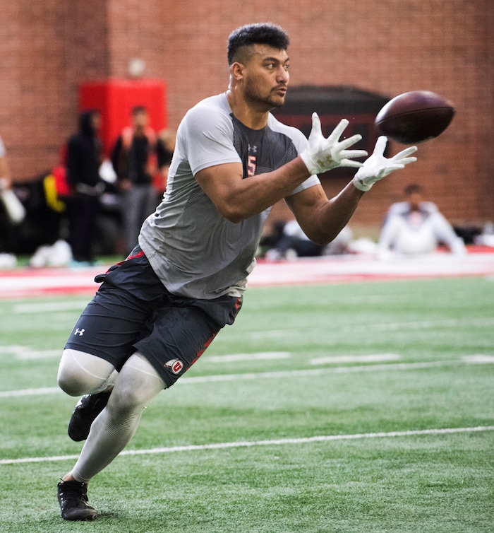 (Rick Egan  |  The Salt Lake Tribune)      Kavika Luafatasaga, catches a pass from Troy Williams during University of Utah's 2018 Pro Day for NFL scouts, at Spence Eccles Field House, Wednesday, March 28, 2018.