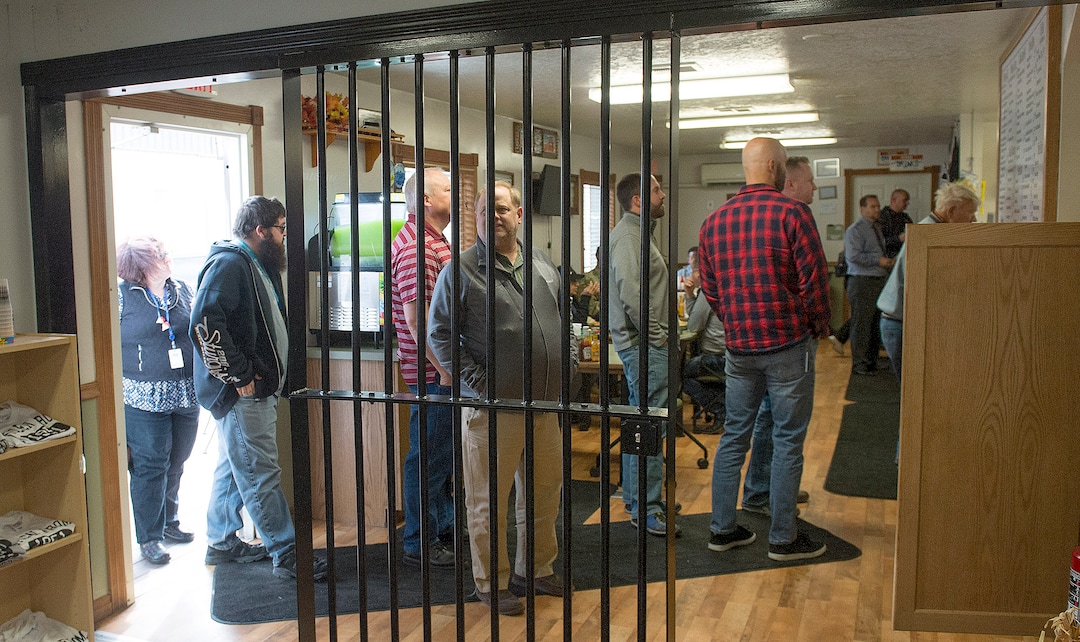 (Leah Hogsten  |  The Salt Lake Tribune) The Serving Time Cafe has a regular following and would-be diners should get there a little early or face the lunchtime crush. Diners on Wednesday, November 1, 2017 peek through prison bars to read the daily specials.  Every Monday through Friday, a half-dozen or so Level 4 inmates file out of the Olympus Facility at the Utah State Prison to cook, bake and serve the public at the Serving Time Caf. The operation is part of Utah Department of Corrections Industries (UCI) and is aimed at helping inmates return to society.