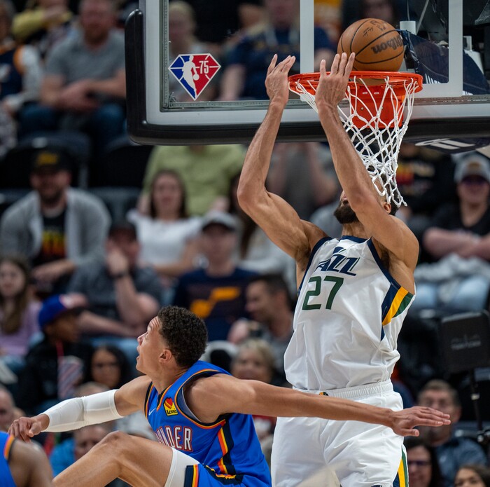(Rick Egan | The Salt Lake Tribune) Utah Jazz center Rudy Gobert (27) scores on a reverse-dunk, in NBA action between the Utah Jazz and the Oklahoma City Thunder at Vivint Arena, on Wednesday, April 6, 2022.
