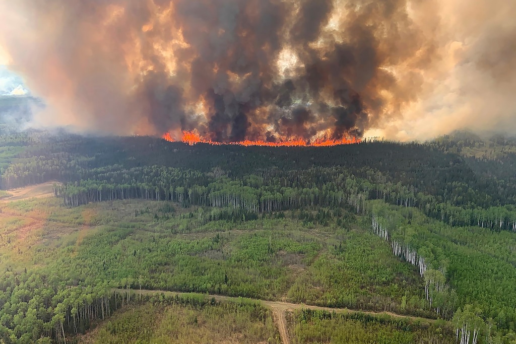 (Government of Alberta Fire Service/Canadian Press via AP) The Bald Mountain Wildfire burns in the Grande Prairie Forest Area in Alberta on Friday, May 12, 2023. Smoke from Canadian wildfires has blown into parts of northern and eastern Utah, the state air quality agency said on Friday, May 19, 2023.