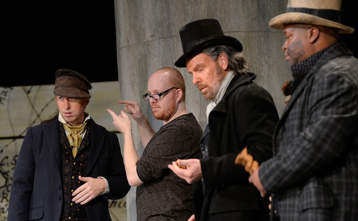 (Francisco Kjolseth  |  The Salt Lake Tribune)  Hair and makeup designer Yancey Quick, second from left, gets confirmation on styling for cast member Joshua Dennis as Greenhorn, during a staged photo shoot for Utah Opera's "Moby-Dick" at the Capitol Theatre for the upcoming 21st-century opera by Jake Heggie based on the classic novel by Herman Melville. Also pictured are Roger Honeywell as Captain Ahab and Musa Ngqungwana as Queequeg.