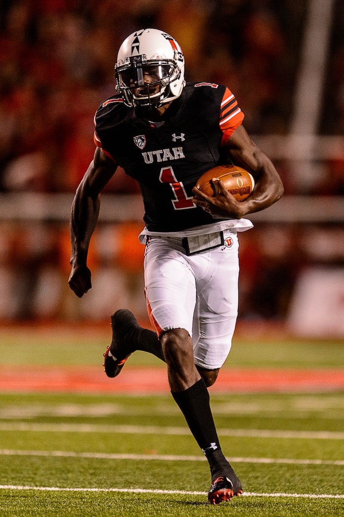 (Trent Nelson | The Salt Lake Tribune) Utah Utes quarterback Tyler Huntley (1) runs the ball as the Utah Utes host the San Jose State Spartans, NCAA football at Rice-Eccles Stadium in Salt Lake City, Saturday September 16, 2017.