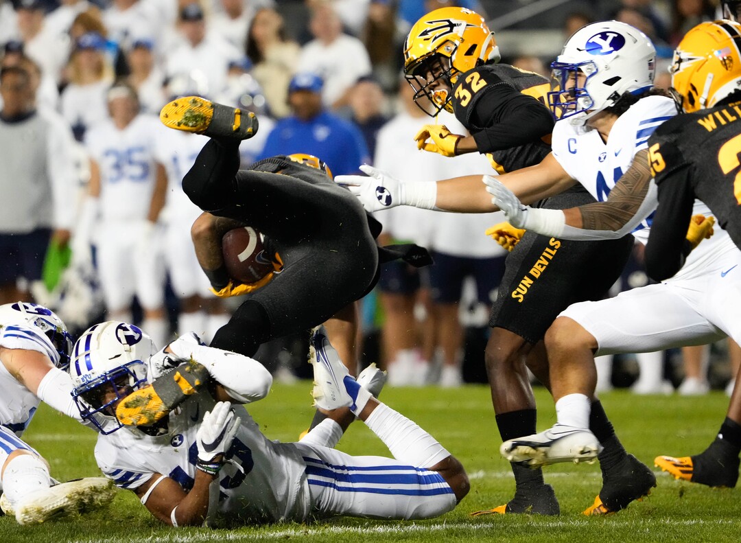 (Francisco Kjolseth | The Salt Lake Tribune) Brigham Young Cougars defensive back Javelle Brown (19) takes down Arizona State Sun Devils wide receiver LV Bunkley-Shelton (6) in football action between the Brigham Young Cougars and the Arizona State Sun Devils at LaVell Edwards Stadium in Provo, on Saturday, Sept. 18, 2021.
