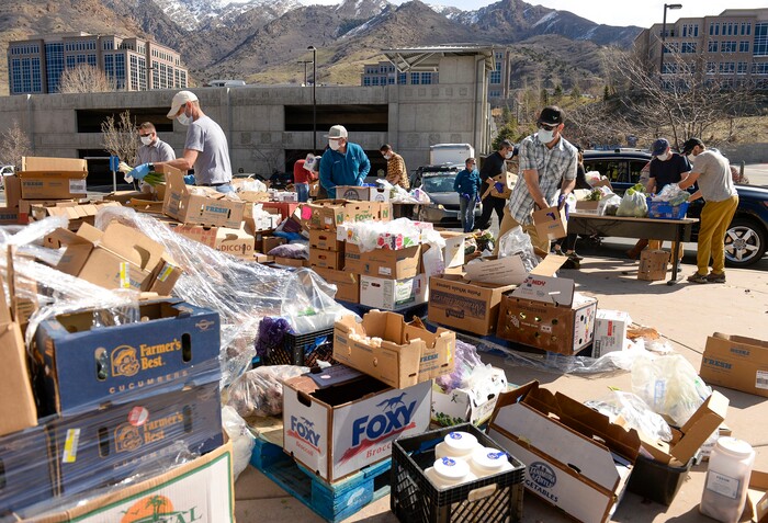 (Leah Hogsten  |  The Salt Lake Tribune)  Snowbird employees handed out over 10,000 pounds of perishable items from the ski resort's restaurants and stores to their workforce, March 21, 2020. The food included milk, eggs, bread, cheeses, every kind of herb, vegetable and fruit, including kumquats and lemon grass, and was given to Snowbird employees on a first-come, first-served basis.