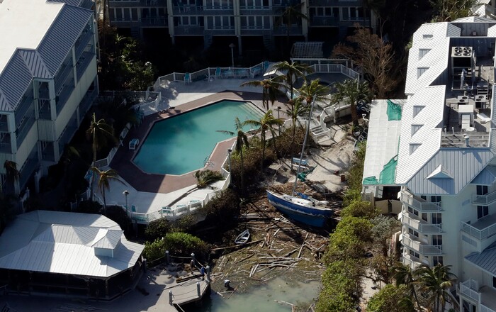 A sailboat is pushed up between two buildings in the aftermath of Hurricane Irma on Tuesday, Sept. 12, 2017, in Key West, Fla. (AP Photo/Chris O'Meara)